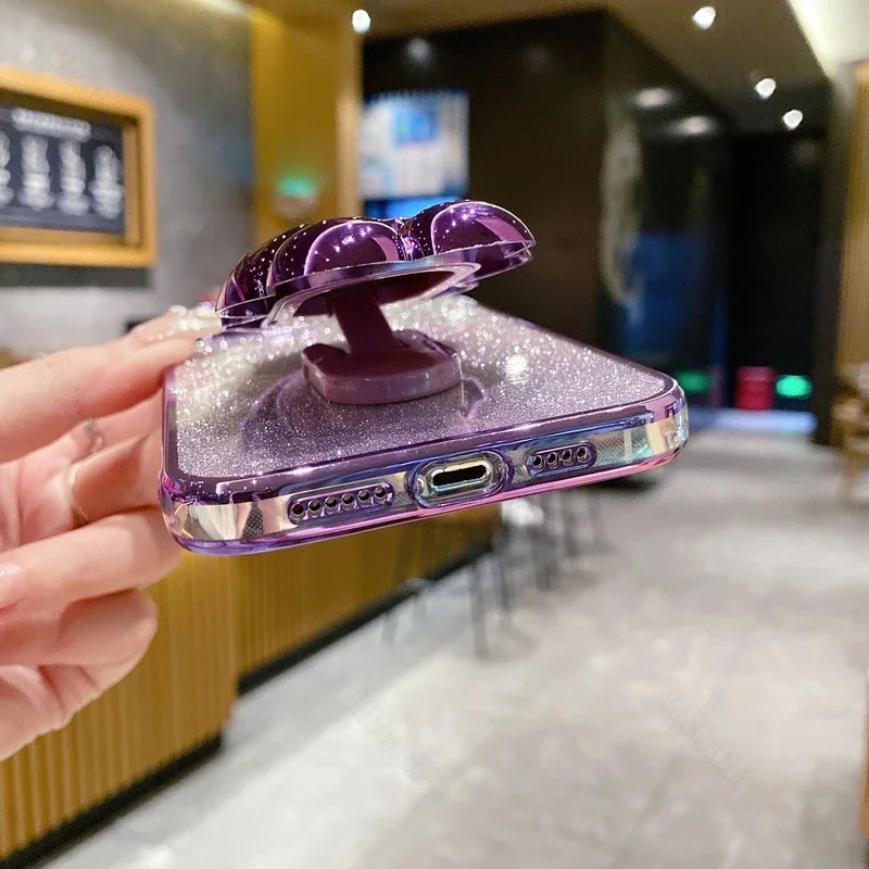 Luxus-Glitzer-Astronauten-Falt-Silikonhülle mit Ständer und Handhalterung für Apple iPhone 17/17 Air, 16/16e, 15, 14, 13 Pro Max Plus | Stoßfest, wasserabweisend & fingerabdruckfrei